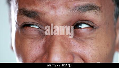 Person feeling disgust emotion, African man grimacing in distaste. black guy disliking close-up face Stock Photo