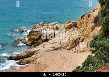 The beautiful beaches with the famous coves of the tourist town of Calella, a famous resort on the Costa Brava in Spain. Stock Photo