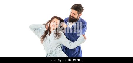 Good morning. Man hold hair of sleepy woman. Family couple in love. Wake up. Early morning Stock Photo