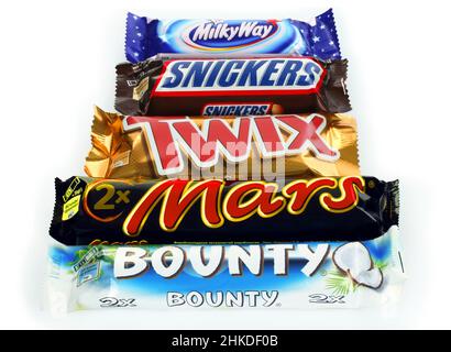 Kiev, Ukraine - December 13, 2021: Mars, Bounty, Twix, Snickers and Milky Way chocolate bars. Mars is a company known for the confectionery items that Stock Photo