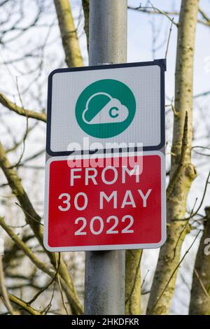 Greater Manchester Clean Air Zone (CAZ) sign, depicting the planned start date of 30th May 2022 for the scheme Stock Photo