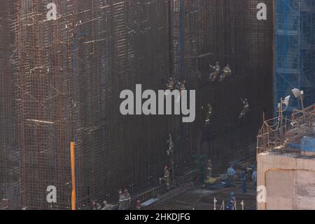 Workers in the building site of the UHE Teles Pires in the Amazon Forest. Stock Photo