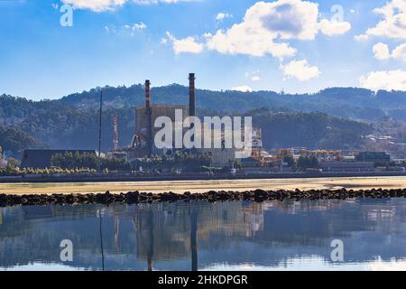 Pontevedra, Galicia,  Spain - 01 24 2022 : Ence Factory  in Ria de Pontevedra Stock Photo
