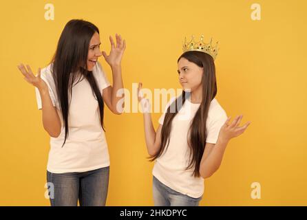 angry mom scold stubborn fussy kid. ignore parent. shout at difficult child. smug. Stock Photo