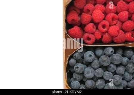 berry harvest. Strawberries, raspberries, blueberries, berries on white background.summer berries. Healthy Sweet Dessert.  Stock Photo