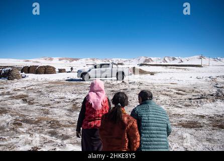 (220204) -- LHASA, Feb. 4, 2022 (Xinhua) -- Tenzin Drolma's family welcomes her home in Gyaga Village of Damxung County, southwest China's Tibet Autonomous Region, Jan. 18, 2022. Tenzin Drolma, 21, was born on the grassland near Lake Namtso in Tibet. In 2020, she was admitted to Jiangsu Food and Pharmaceutical Science College in east China's Jiangsu Province as a Chinese pharmacy major student. The college life in the outside world is fresh to Drolma. She met many new classmates and made many friends. When winter vacation came, Drolma returned to her beloved home. 'I leave my hometown in Stock Photo