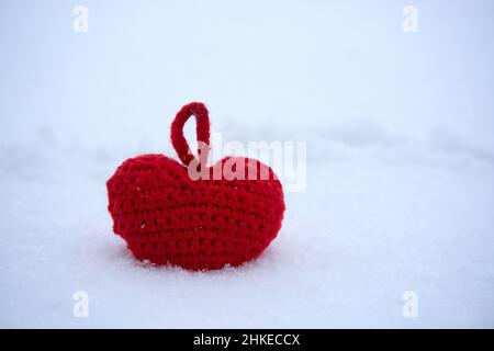 Red heart in the snow, Valentines Day card, be my valentine Stock Photo