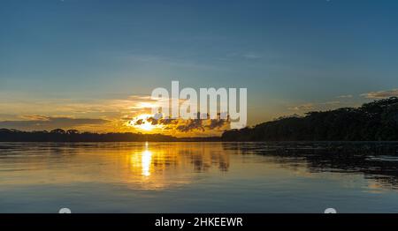 Amazon rainforest sunset panorama along the Pastaza river, Ecuador. Stock Photo