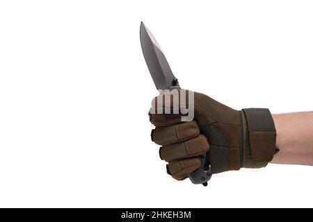 Hand in tactical glove, holding folding knife, on white background Stock Photo