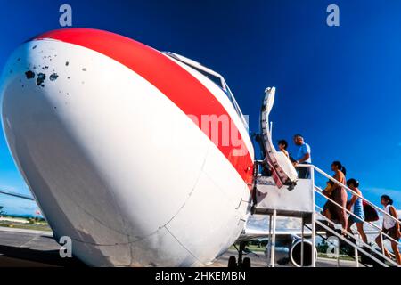 Passengers boarding Air Philippines flight from Cebu to Manila, Philippines Stock Photo