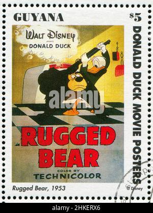 GUYANA - CIRCA 1994: stamp printed by Guyana, shows Walt Disney characters, Rugged Bear, circa 1994 Stock Photo