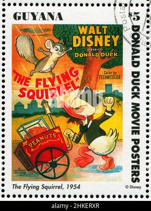 GUYANA - CIRCA 1994: stamp printed by Guyana, shows Walt Disney characters, The Flying Squirrel, circa 1994 Stock Photo