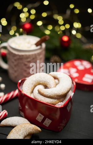 Heart shaped Gift box full of Traditional German or Austrian Vanillekipferl vanilla kipferl cookies Stock Photo