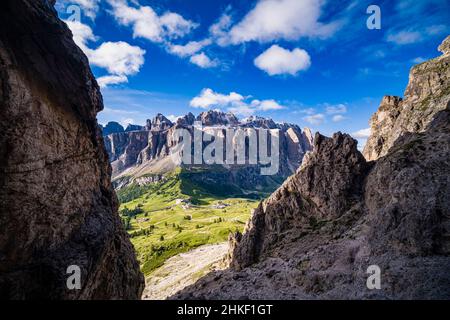 Aerial view on Gardena Pass, rock faces of Sella group and Piz Boe, seen from the summit of Grand Cir. Stock Photo