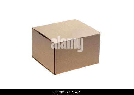 Closed cardboard box isolated on white background. Courier delivery concept, parcel delivery. Single object Stock Photo