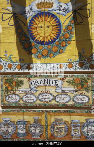 Italy, Sicily, Taormina, colorful mosaics on the facade of the bam bar, gourmet institution specializing in granite Stock Photo