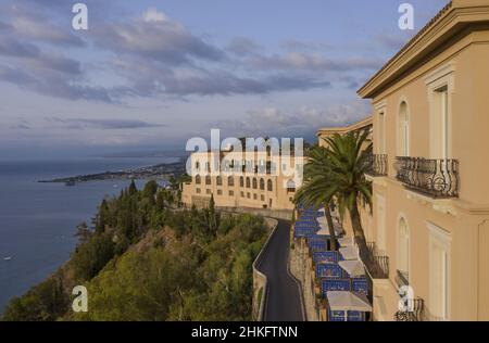 Italy, Sicily, Taormina, San Domenico Palace, former Dominican convent transformed into a luxury hotel, property of the Four Seasons group, nestled in the medieval town center of Taormina and perched on top of a hill above the Ioni sea (view Aerial) Stock Photo