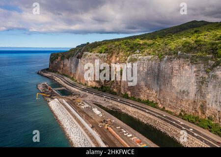 France, Reunion island (French overseas department), La Possession, construction of the dike of the New Coastal Route (Nouvelle Route du Littoral - NRL) between the capital Saint-Denis and the main commercial port to the West, connection to the 4-way road at La Possession (aerial view) Stock Photo
