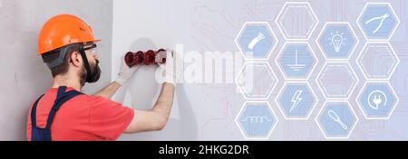 electrician in helmet installs sockets infographics Stock Photo