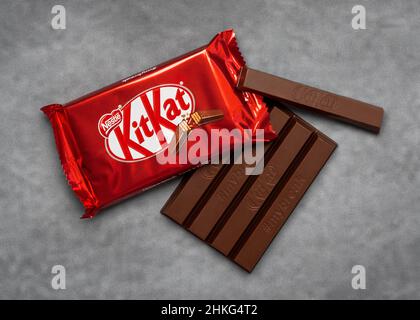 Kit Kat Nestle chocolate bars over gray background Stock Photo