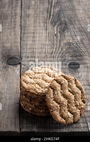 Wholegrain  rye crispbread on wooden background Stock Photo