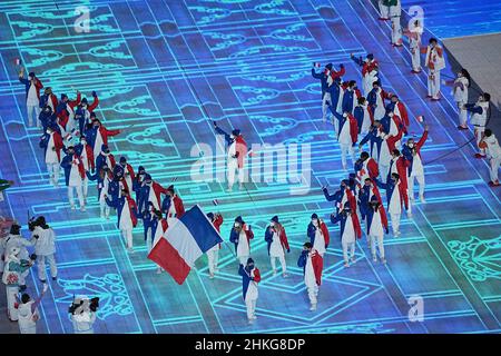 Beijing, China. 04th Feb, 2022. Olympics: Opening ceremony in the Olympic stadium 'Bird's Nest'. The team from France with flag bearers Tessa Worley and Kevin Rolland enters the stadium. Credit: Michael Kappeler/dpa/Alamy Live News Stock Photo