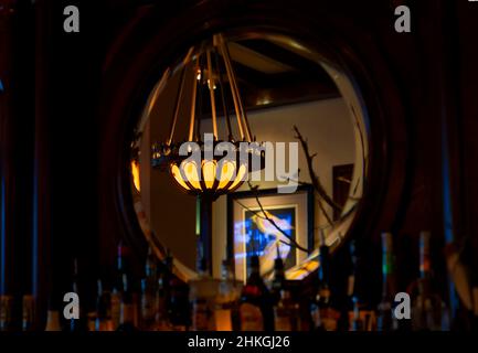 Mirror behind the bar Stock Photo