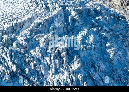 Beautiful patterns carved into snow by nature. Stock Photo