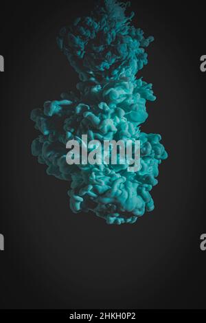 blue-green cloud on a black background. Stock Photo