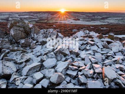 Sunrise over the Long Mynd, seen from Saddle Rock on the Stiperstones, Shropshire. Stock Photo