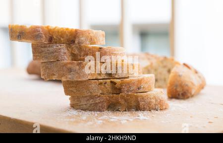 fresh loaf of bread on wooden board Stock Photo