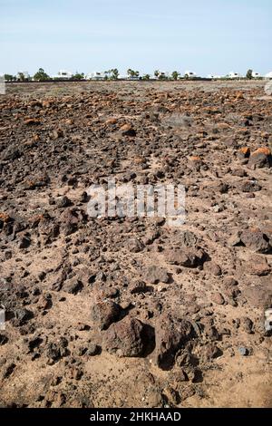 volcanic stone rock fields  building development plot in playa blanca Lanzarote Canary Islands Spain Stock Photo