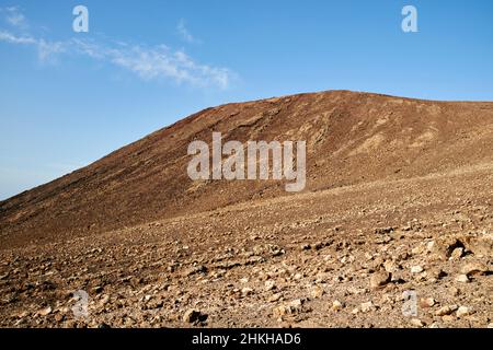 upper slopes of the caldera of red montana roja extinct volcano near playa blanca Lanzarote Canary Islands Spain Stock Photo