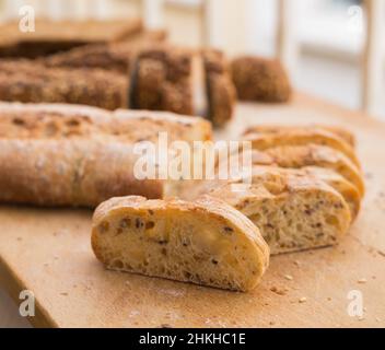 fresh loaf of bread on wooden board Stock Photo