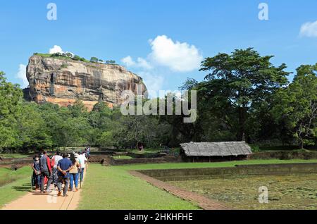 Tourists visiting Sigiriya ancient rock fortress in Sri Lanka Stock Photo