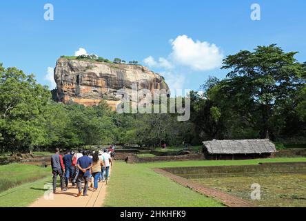 Tourists visiting Sigiriya ancient rock fortress in Sri Lanka Stock Photo