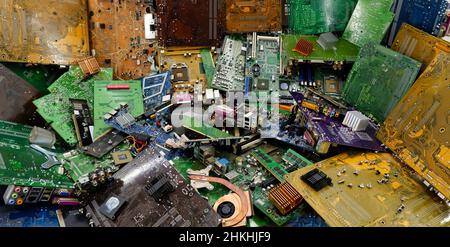 Electronic printed circuit boards in an electronics dump. Stock Photo