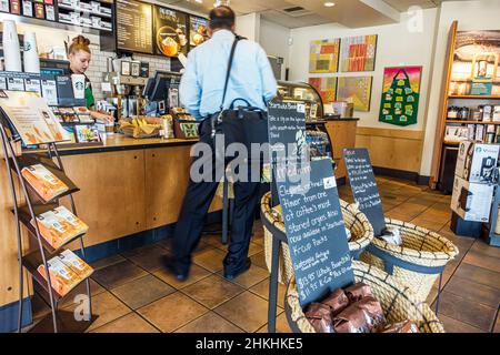 Springfield Illinois,Starbucks Coffee,barista cafe,interior inside counter customer baskets display sale Stock Photo