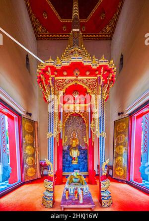 The interior of the temple of Wat Chakrawat with Altar and golden Buddha statue, Bangkok, Thailand Stock Photo