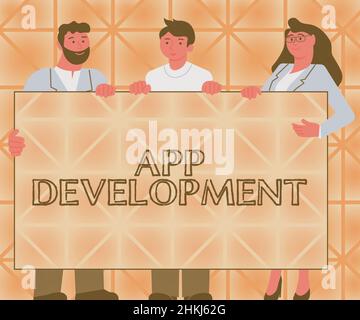 Handwriting text App Development. Internet Concept Development services for awesome mobile and web experiences Three Colleagues Holding Presentation Stock Photo