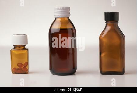 Three brown medicine bottles Stock Photo