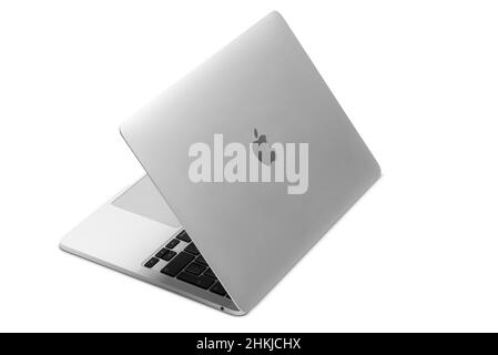 Izmir, Turkey - January 10, 2022: Half opened Apple Brand M1 Model Macbook pro laptop computer on a white background Stock Photo