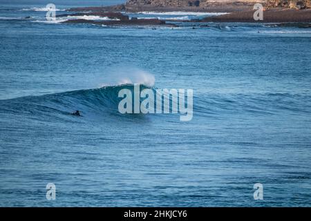 Perfect wave breaking in a beach. Surf spot Stock Photo