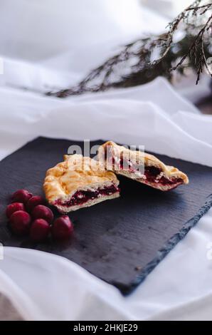 traditional cherry pie on a dark plate Stock Photo