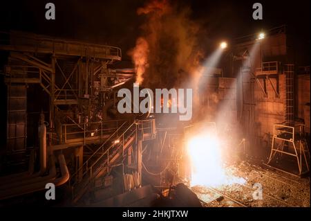 Discharge of liquid metal from a metallurgical furnace Stock Photo