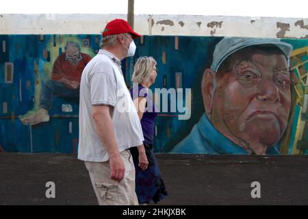 Tenerife, Spain. 04th Feb, 2022. January 25, 2022, Tenerife, Spain: The memory of a fishing village reflected in a mural in Los Abrigos. The muralist Michel Diaz has started a project where he tells the story of the women who sold fish, the Virgin of Carmen, patron saint of fishermen, and several inhabitants, including a famous cat. (Credit Image: © Mercedes Menendez/Pacific Press via ZUMA Press Wire) Credit: ZUMA Press, Inc./Alamy Live News Stock Photo