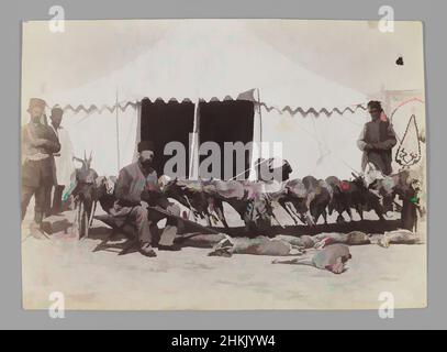 Art inspired by Prince Abdul Husayn Mirza, Farma Farmaian Seated before Hunted Gazelles, One of 274 Vintage Photographs, Albumen silver photograph, late 19th-early 20th century, Qajar, Qajar Period, 4 3/4 x 6 5/8 in., 12.1 x 16.9 cm, camping, cruel, dead, guns, man, pride, servants, Classic works modernized by Artotop with a splash of modernity. Shapes, color and value, eye-catching visual impact on art. Emotions through freedom of artworks in a contemporary way. A timeless message pursuing a wildly creative new direction. Artists turning to the digital medium and creating the Artotop NFT Stock Photo