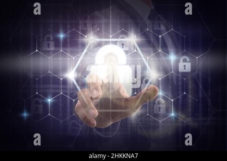 Double exposure of Businessman Hand touching the Security key lock icon digital display over the world map and Hexagon shape on the Artificial intelli Stock Photo