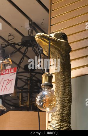 Gold ostrich store wall light