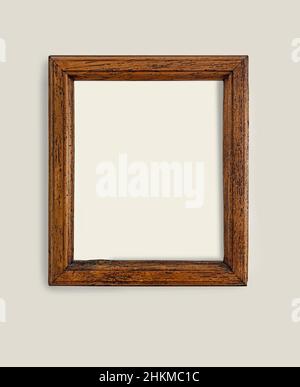 old wood empty frame on a grey wall Stock Photo